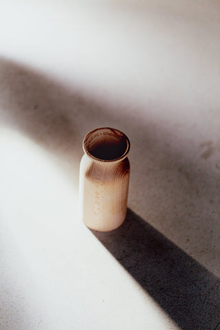 ceramic kirri vessel casting a long shadow