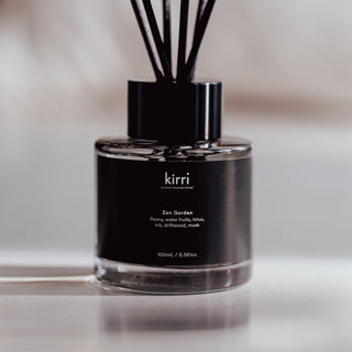kirri zen garden reed diffuser with black reeds in soft light